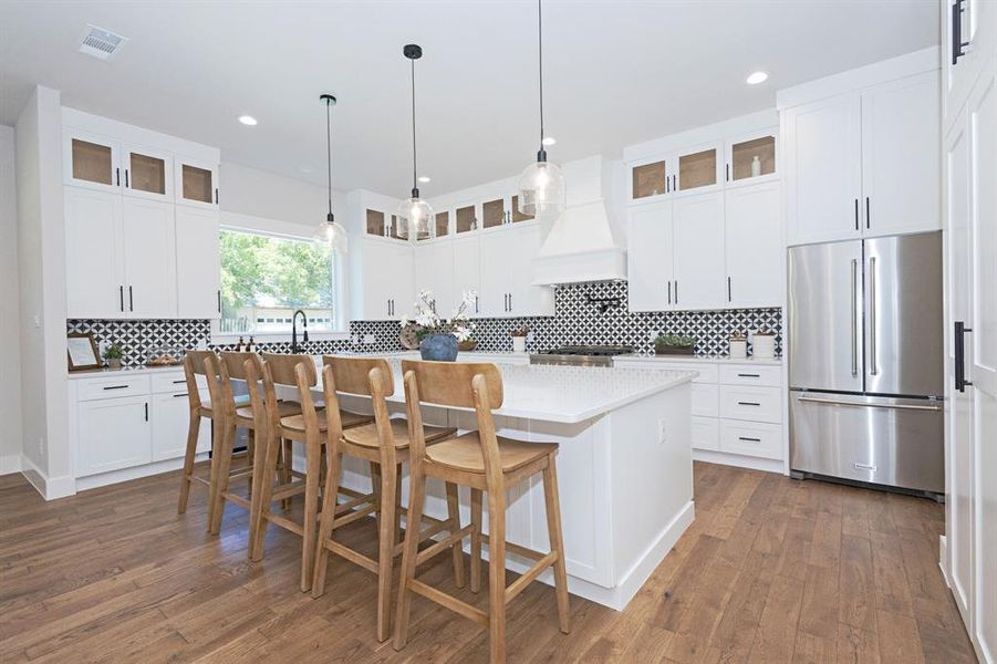The Heart of the Home- Bright, Open, and Beautifully Designed with Quartz Countertops, Premium KitchenAid Appliances and room for everyone. The Heart of the Home- Bright, Open, and Beautifully Designed with Quartz Countertops, Premium KitchenAid Appliances and room for everyone.