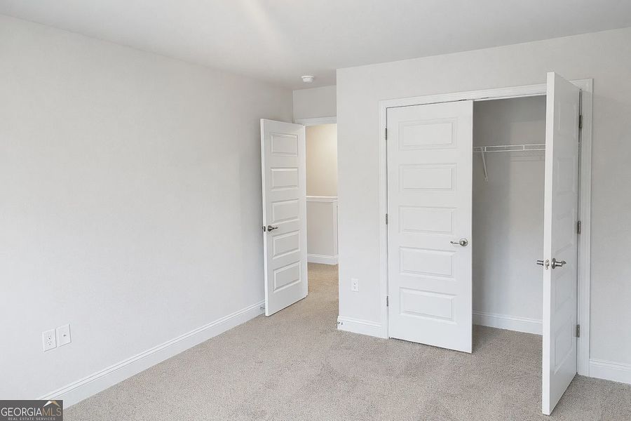 Spacious, unfurnished interior of a new home in Canterbury Villas, Carrollton (Image 24).