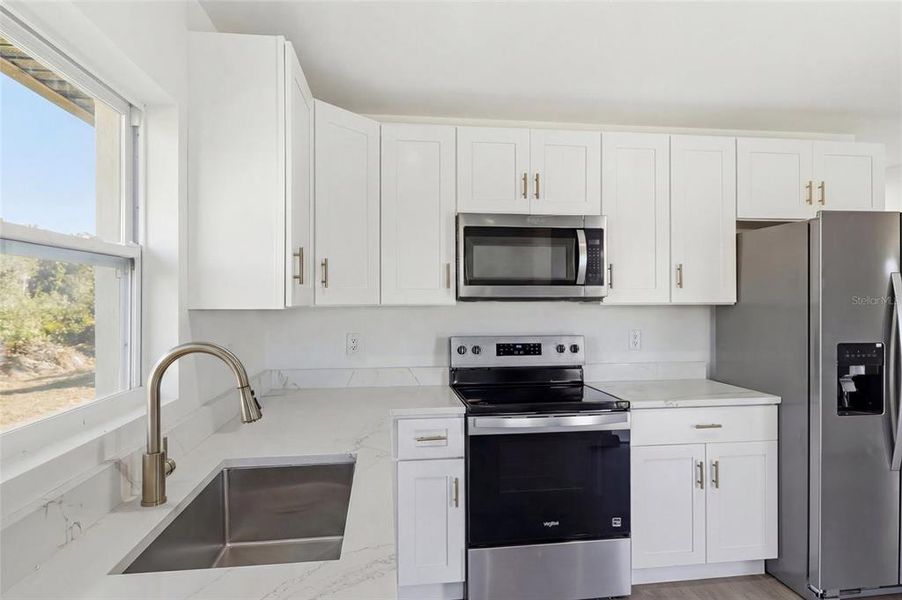 Furnished interior view inside a new home in , Port Charlotte (Image 4).
