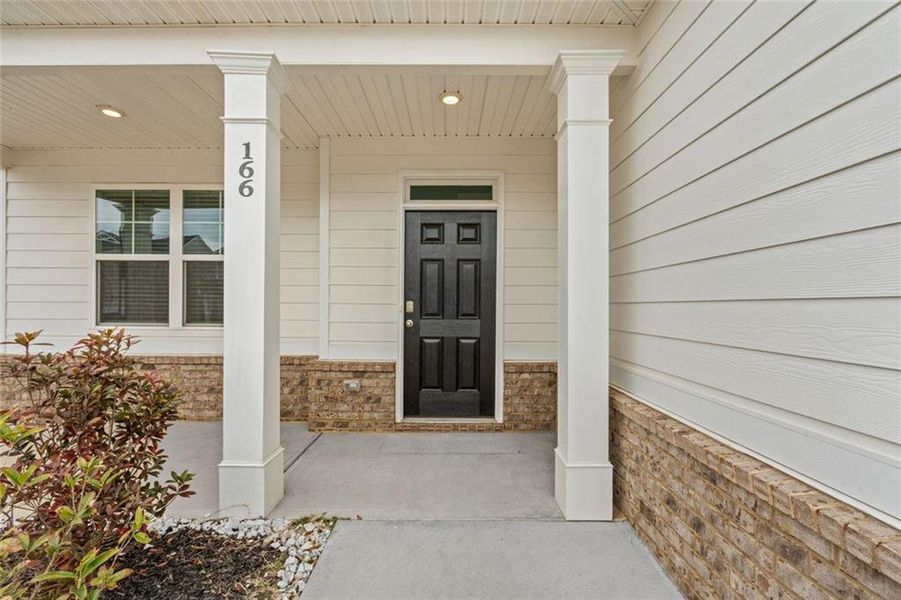 Exterior details and patio area of a home in Twin Lakes, Hoschton (Image 3).