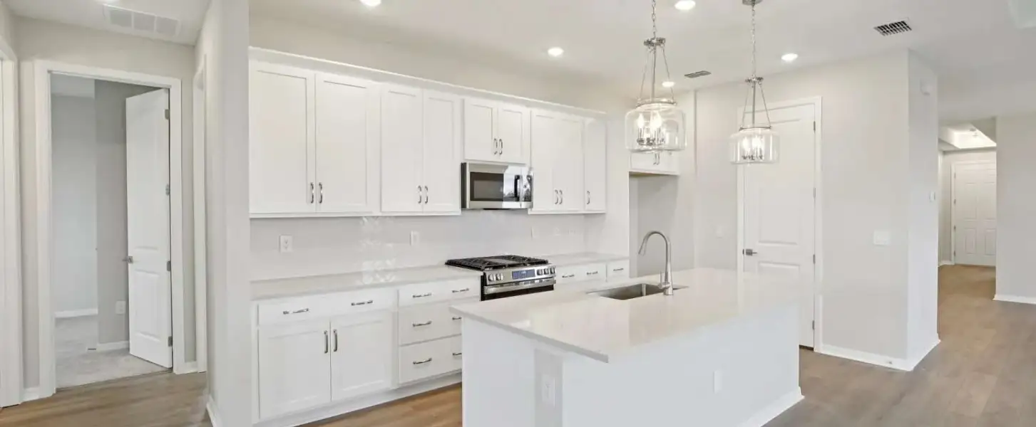 Spacious kitchen layout will feature AW Collection® Serene - Representative images and renderings are for illustrative purposes. Actual structural options and design finishes of home may vary.