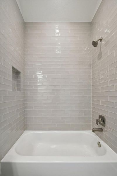 Tile to the ceiling in every Bath!