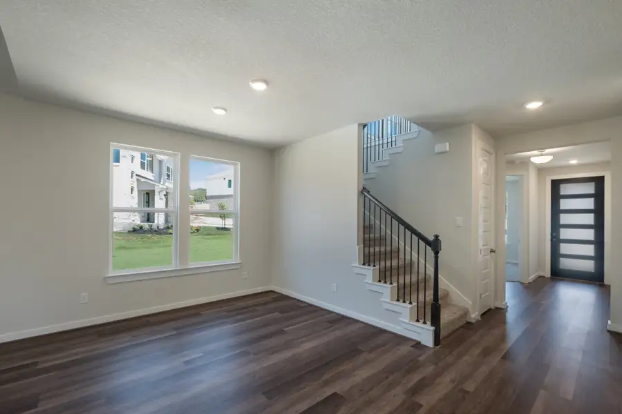 Representative unfurnished interior of a home built from the Pleasanton by Scott Felder Homes in Flora, Hutto (Image 8).