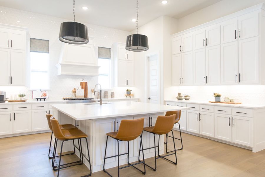 Representative furnished interior of a home built from the 7012 by Tradition Homes in Mustang Lakes, McKinney (Image 4).