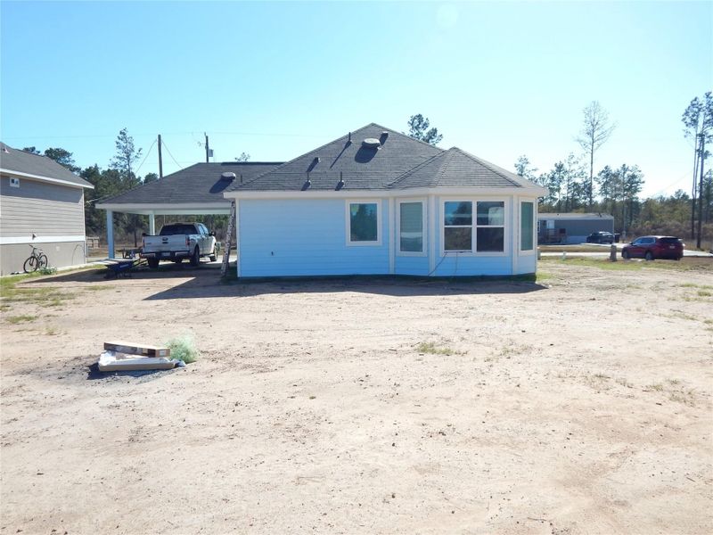 Exterior details and patio area of a home in , Conroe (Image 6).