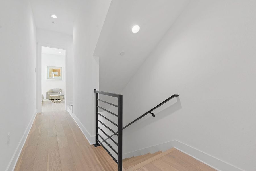 Staircase Leading into the primary suite.