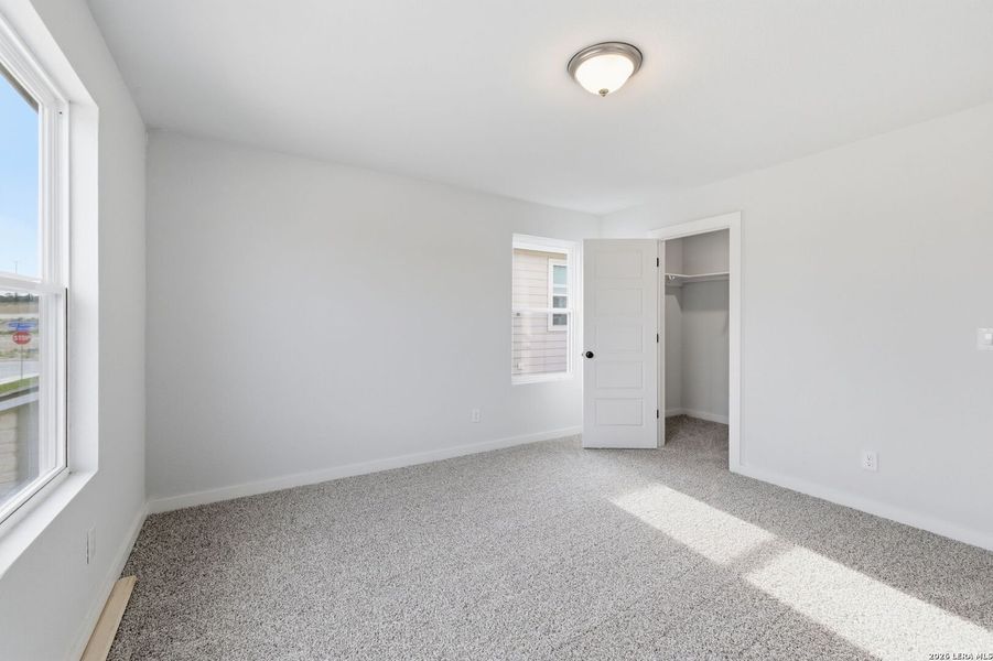 Spacious, unfurnished interior of a new home in The Meadows at Hunters Ranch, San Antonio (Image 24).