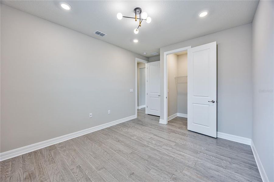 Spacious, unfurnished interior of a new home in Phillips Grove, Orlando (Image 39).