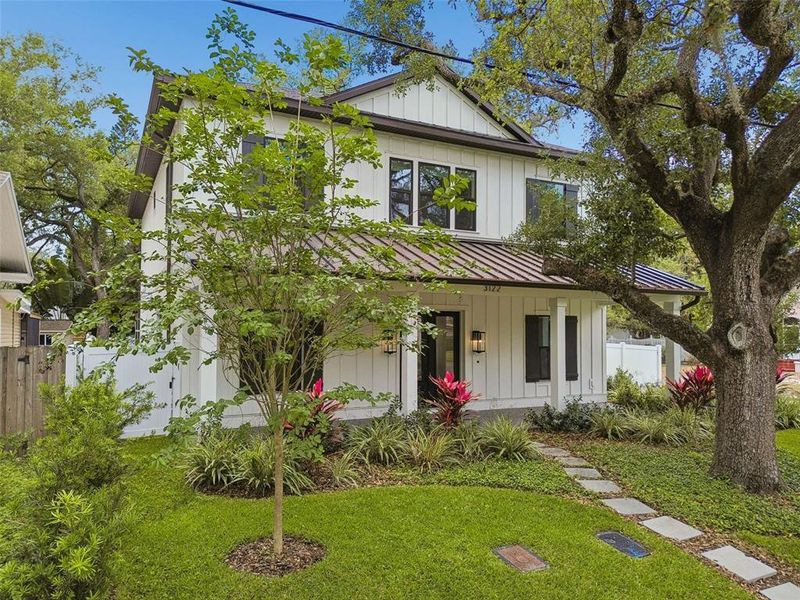 Front exterior of a new home in , Tampa, FL, highlighting curb appeal (Image 26).