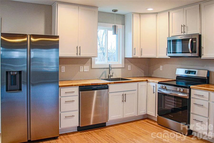 Furnished interior view inside a new home in , Asheville (Image 6).