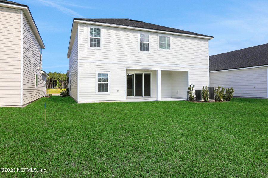 Exterior details and patio area of a home in Amberly, Green Cove Springs (Image 28).