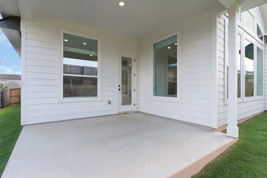 Exterior details and patio area of a home in Lariat, Liberty Hill (Image 4).