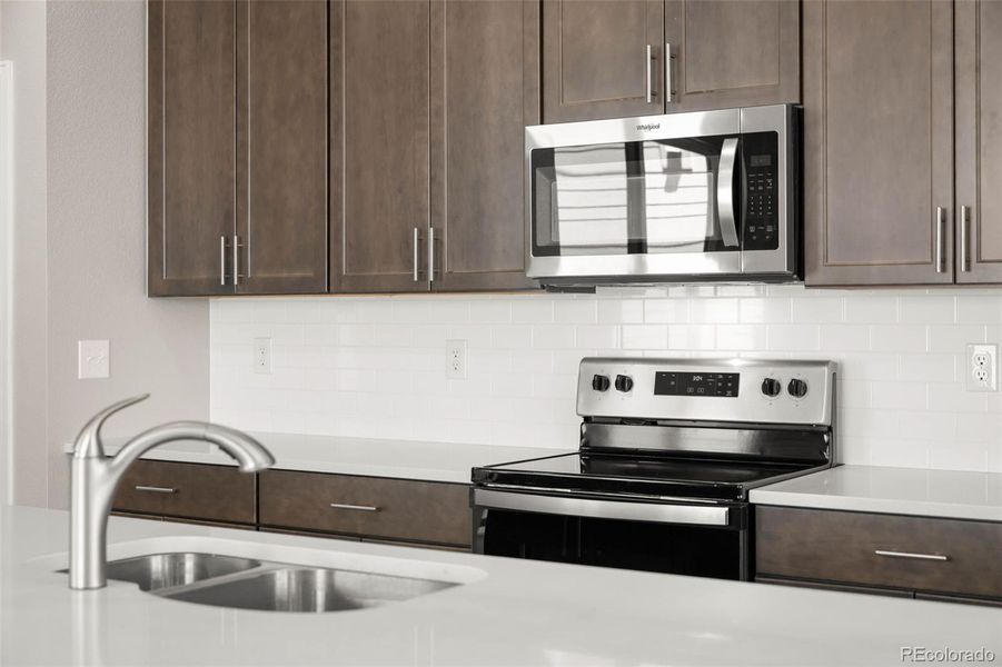 Furnished interior view inside a new home in Painted Prairie, Aurora (Image 11).