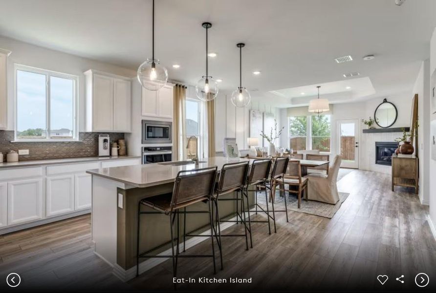 Interior photos- Photo of Pulte model home with same floor plan, not of actual home listed.