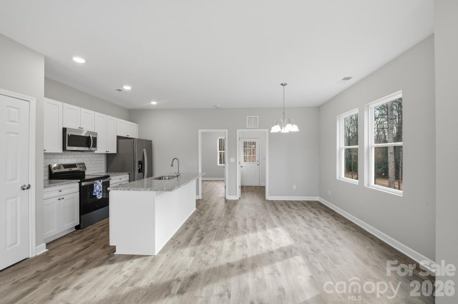 Furnished interior view inside a new home in , Statesville (Image 12).