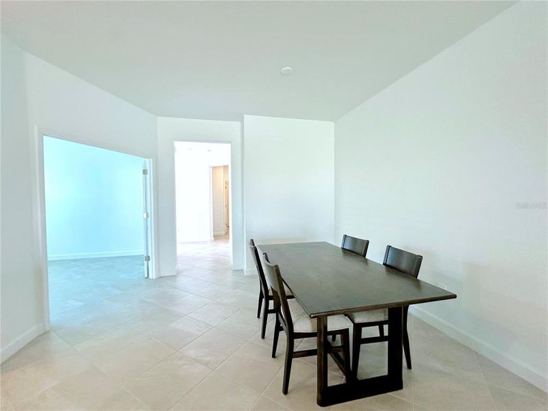 Furnished interior view inside a new home in Palm Lake at Coco Bay, Englewood (Image 15).
