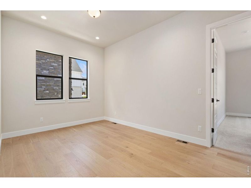 Spacious, unfurnished interior of a new home in The Fairways at RainDance, Windsor (Image 19).