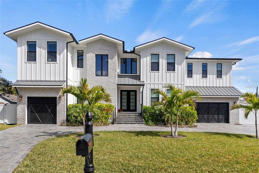 Front exterior of a new home in , Tampa, FL, highlighting curb appeal (Image 28).