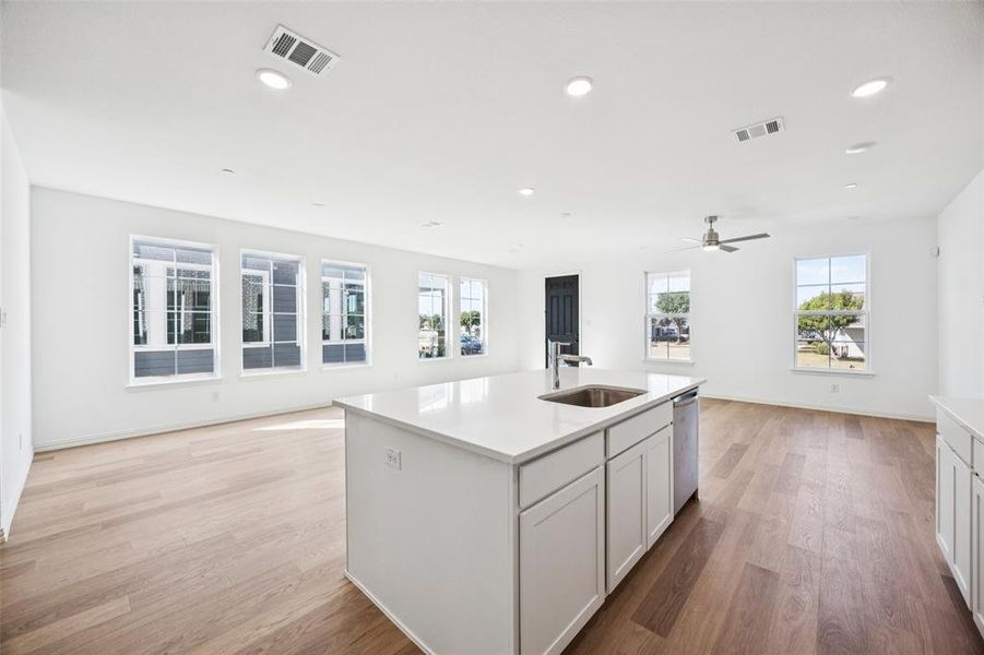 The spacious island offers the perfect place for friends and family to gather round!