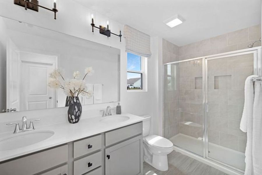 Representative furnished interior of a home built from the Whitney by True Homes in Westbrook Falls, Colfax (Image 28).