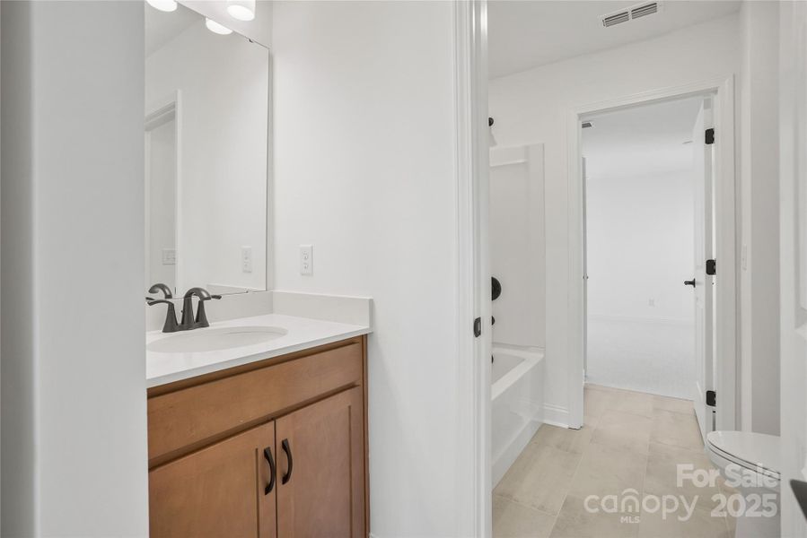 Furnished interior view inside a new home in Forest Creek, Waxhaw (Image 5).