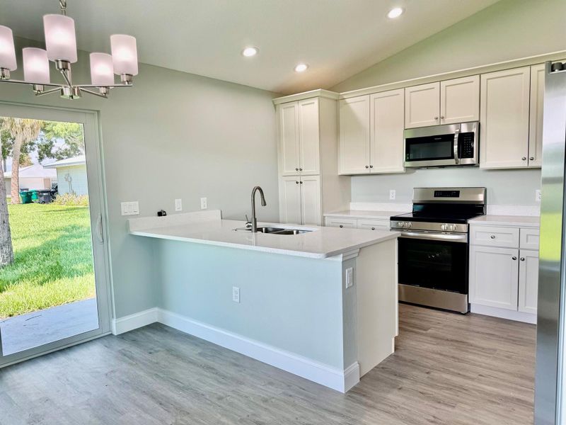Furnished interior view inside a new home in , Okeechobee (Image 5).