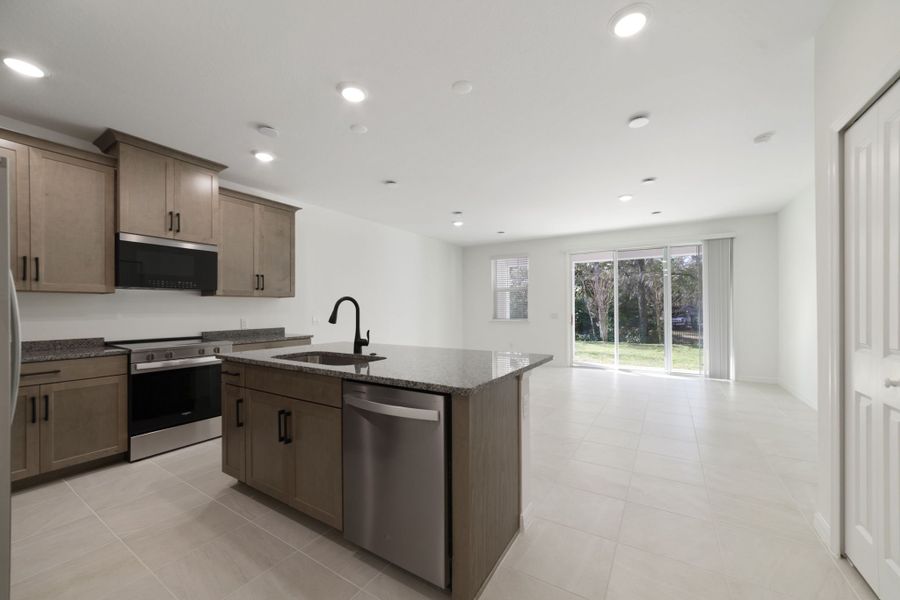 Furnished interior view inside a new home in Towns at Greenleaf, Oviedo (Image 8).