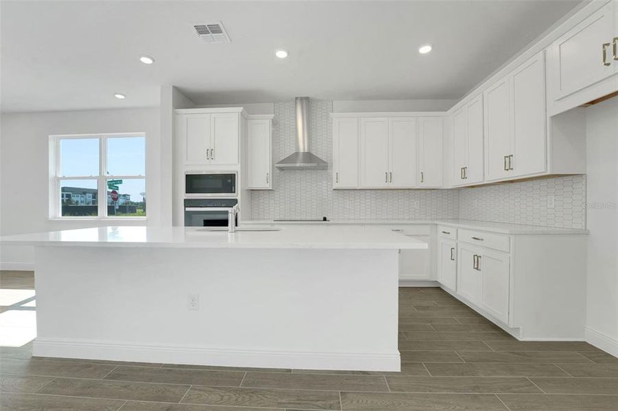 Furnished interior view inside a new home in Crossroads at Kelly Park, Apopka (Image 11). Furnished interior view inside a new home in Crossroads at Kelly Park, Apopka (Image 11).