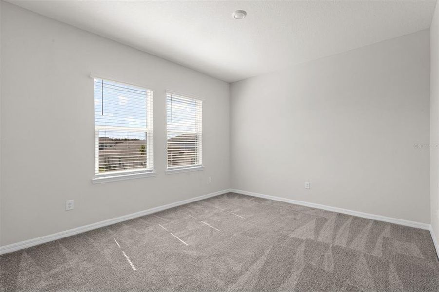 Spacious, unfurnished interior of a new home in River Landing, Wesley Chapel (Image 22).