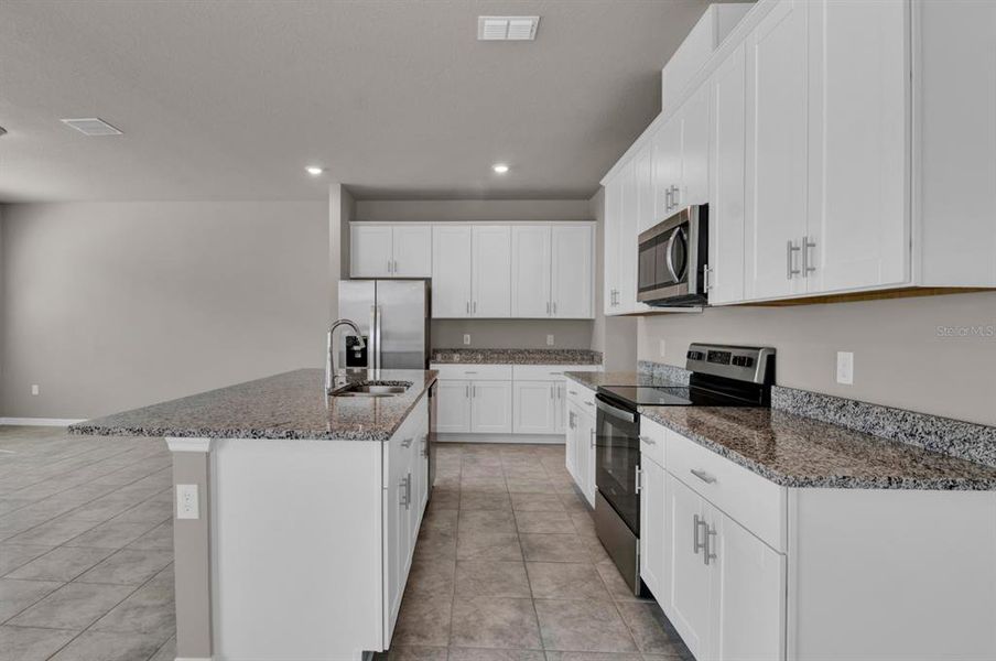 Furnished interior view inside a new home in , Clermont (Image 13).