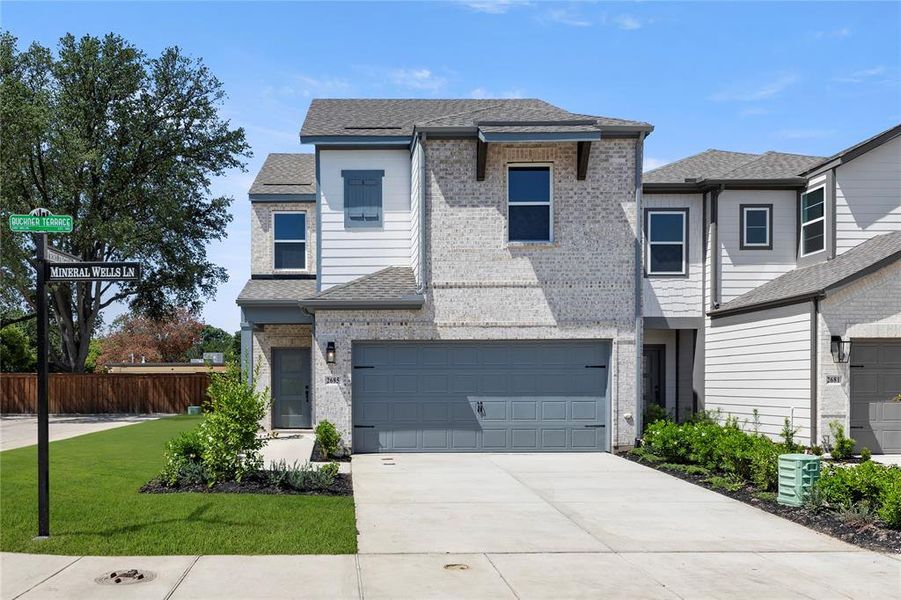 Front exterior of a new home in Sereno Oaks at Buckner Terrace, Dallas, TX, highlighting curb appeal (Image 2). Front exterior of a new home in Sereno Oaks at Buckner Terrace, Dallas, TX, highlighting curb appeal (Image 2).