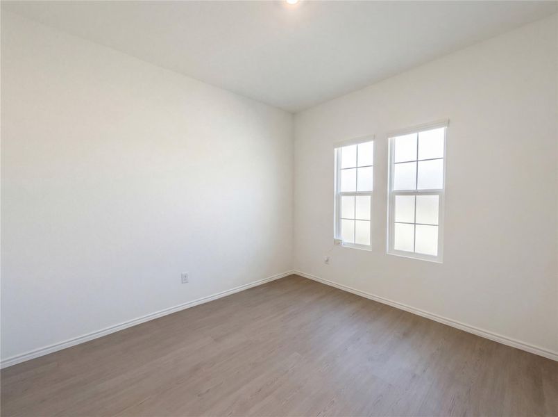 Spacious, unfurnished interior of a new home in The Colony, Bastrop (Image 31).