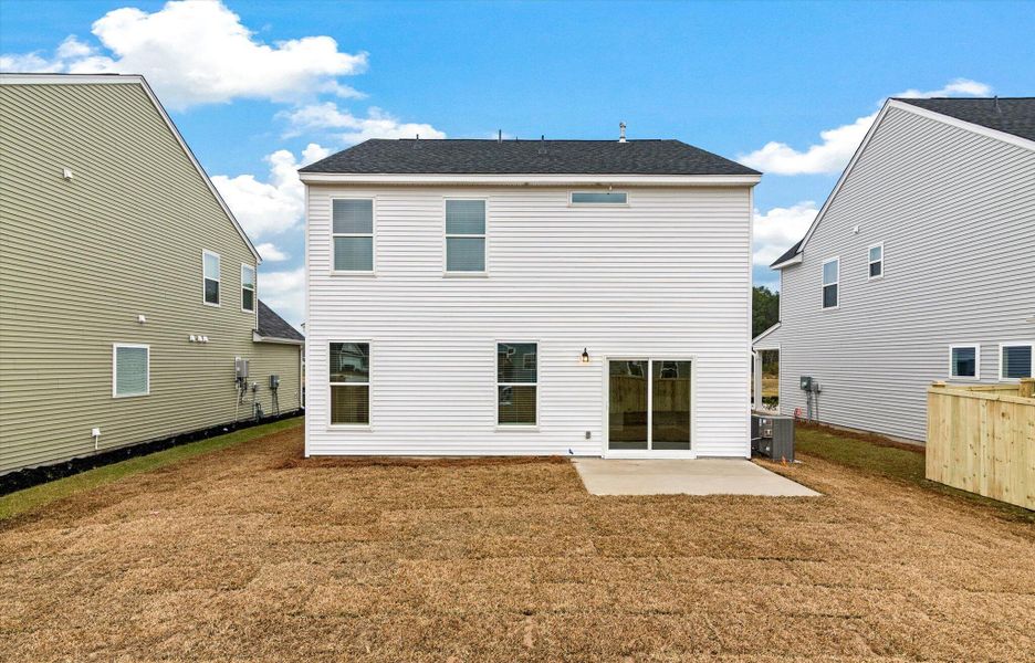 Exterior details and patio area of a home in Oakley Pointe, Moncks Corner (Image 21). Exterior details and patio area of a home in Oakley Pointe, Moncks Corner (Image 21).