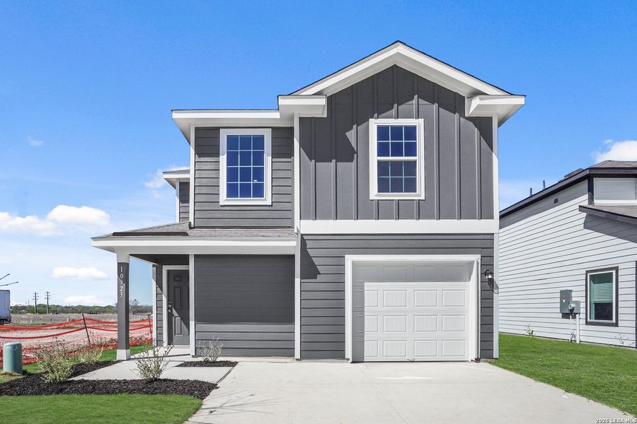 Front exterior of a new home in Applewhite Meadows, San Antonio, TX, highlighting curb appeal (Image 1). Front exterior of a new home in Applewhite Meadows, San Antonio, TX, highlighting curb appeal (Image 1).