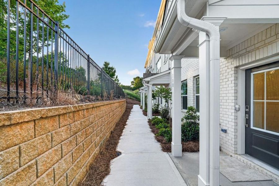 Exterior details and patio area of a home in Chandler Run, Tucker (Image 3).