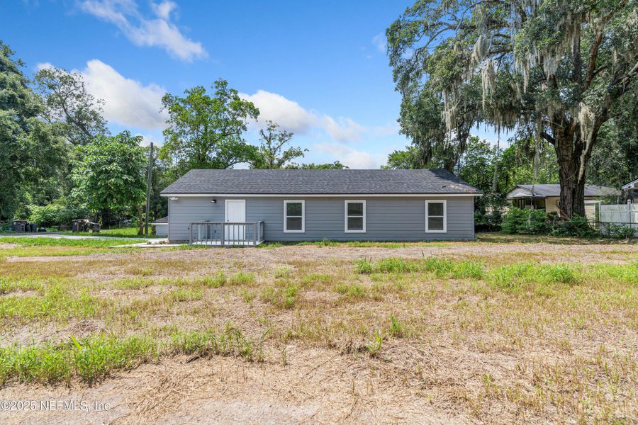 Front exterior of a new home in , Jacksonville, FL, highlighting curb appeal (Image 20). Front exterior of a new home in , Jacksonville, FL, highlighting curb appeal (Image 20).