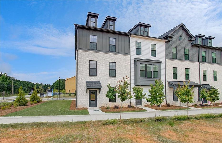 Front exterior of a new home in Silverock, McDonough, GA, highlighting curb appeal (Image 18).