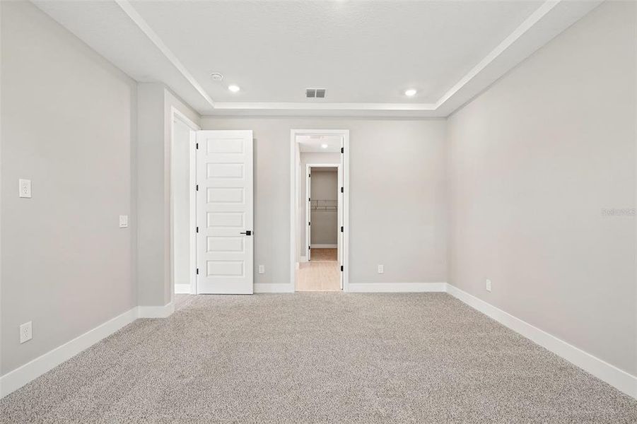 Spacious, unfurnished interior of a new home in Legends Preserve - Signature Series, Daytona Beach (Image 22).