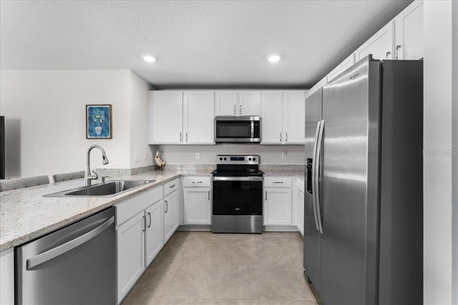 Furnished interior view inside a new home in Bella Lago, Parrish (Image 5).