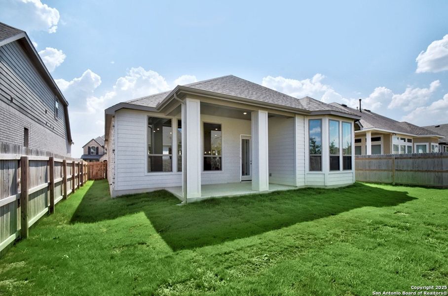 Front exterior of a new home in Davis Ranch: 50ft. lots, San Antonio, TX, highlighting curb appeal (Image 2). Front exterior of a new home in Davis Ranch: 50ft. lots, San Antonio, TX, highlighting curb appeal (Image 2).