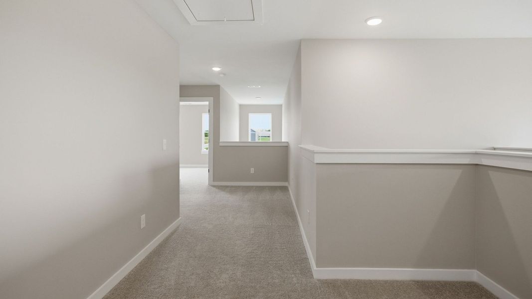 Hall up with access to secondary bedrooms Hall up with access to secondary bedrooms