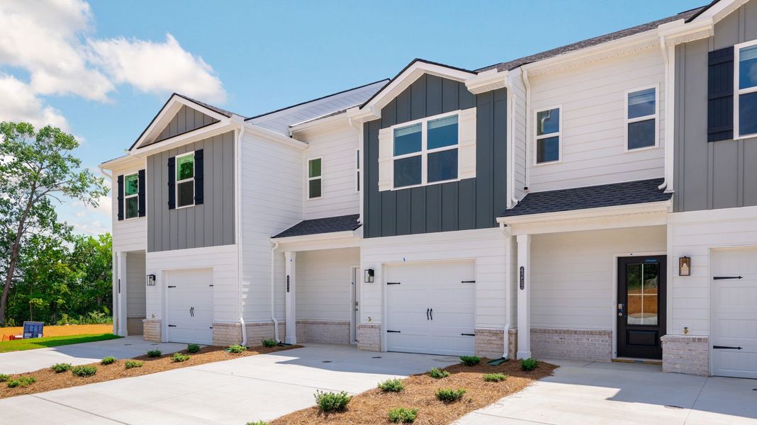 Representative exterior photo of a completed home built from the Altamont Townhome by D.R. Horton in Belcourt Landing, Cleveland, TN (Image 2).