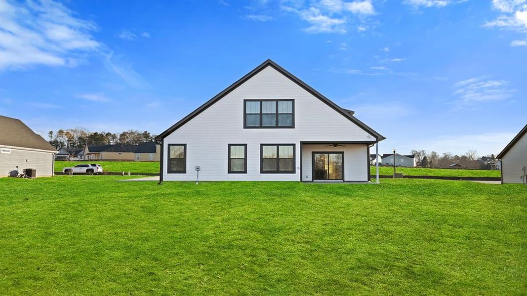 Exterior details and patio area of a home in Alder Pond, Campobello (Image 18).