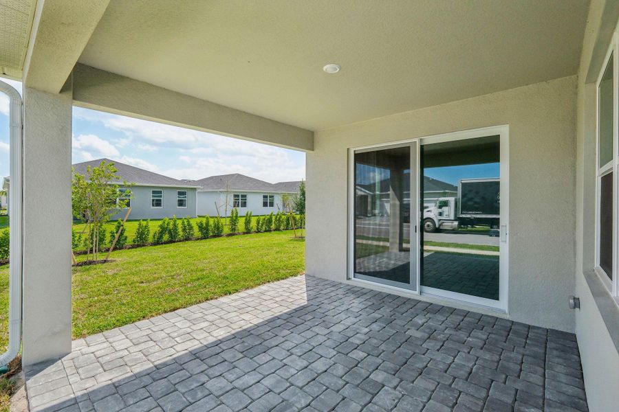 Exterior details and patio area of a home in Brystol at Wylder - Reserve Series, Port St. Lucie (Image 22). Exterior details and patio area of a home in Brystol at Wylder - Reserve Series, Port St. Lucie (Image 22).