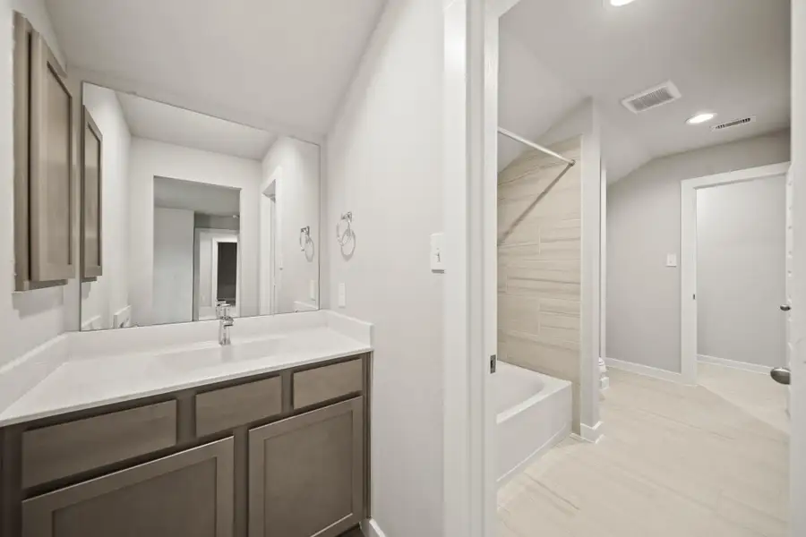 Furnished interior view inside a new home in Grand Oaks – The Cove, Houston (Image 7). Furnished interior view inside a new home in Grand Oaks – The Cove, Houston (Image 7).