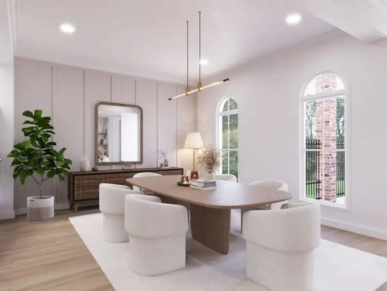 Recessed lighting, wood-finish flooring, and arched windows