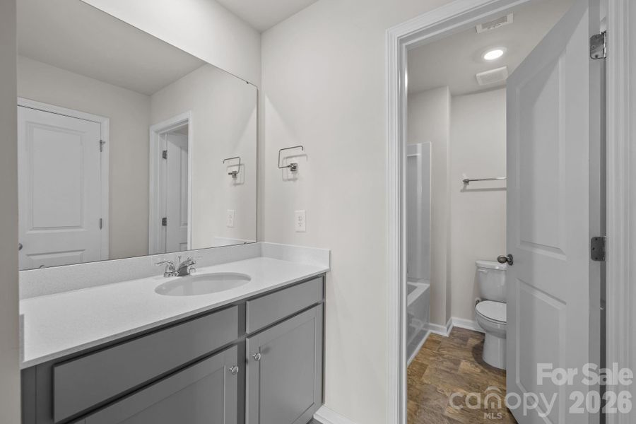 Furnished interior view inside a new home in McFarland Estates, York (Image 8).