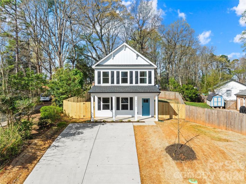 Front exterior of a new home in , Charlotte, NC, highlighting curb appeal (Image 2). Front exterior of a new home in , Charlotte, NC, highlighting curb appeal (Image 2).