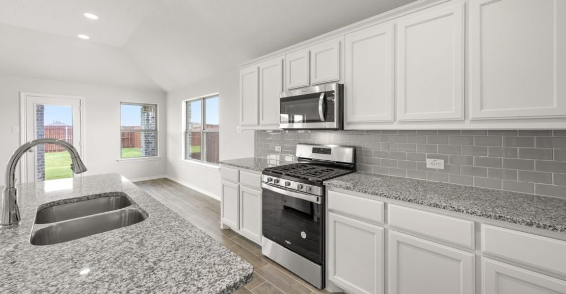 Representative exterior photo of a completed home built from the Atlanta by Impression Homes in Baker Farms, Cleburne, TX (Image 7). Representative exterior photo of a completed home built from the Atlanta by Impression Homes in Baker Farms, Cleburne, TX (Image 7).