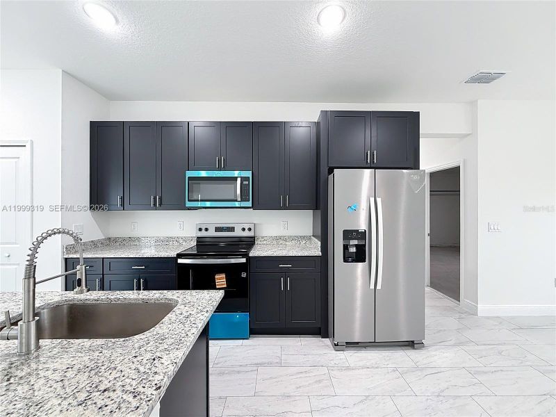 Furnished interior view inside a new home in , Ocala (Image 7).